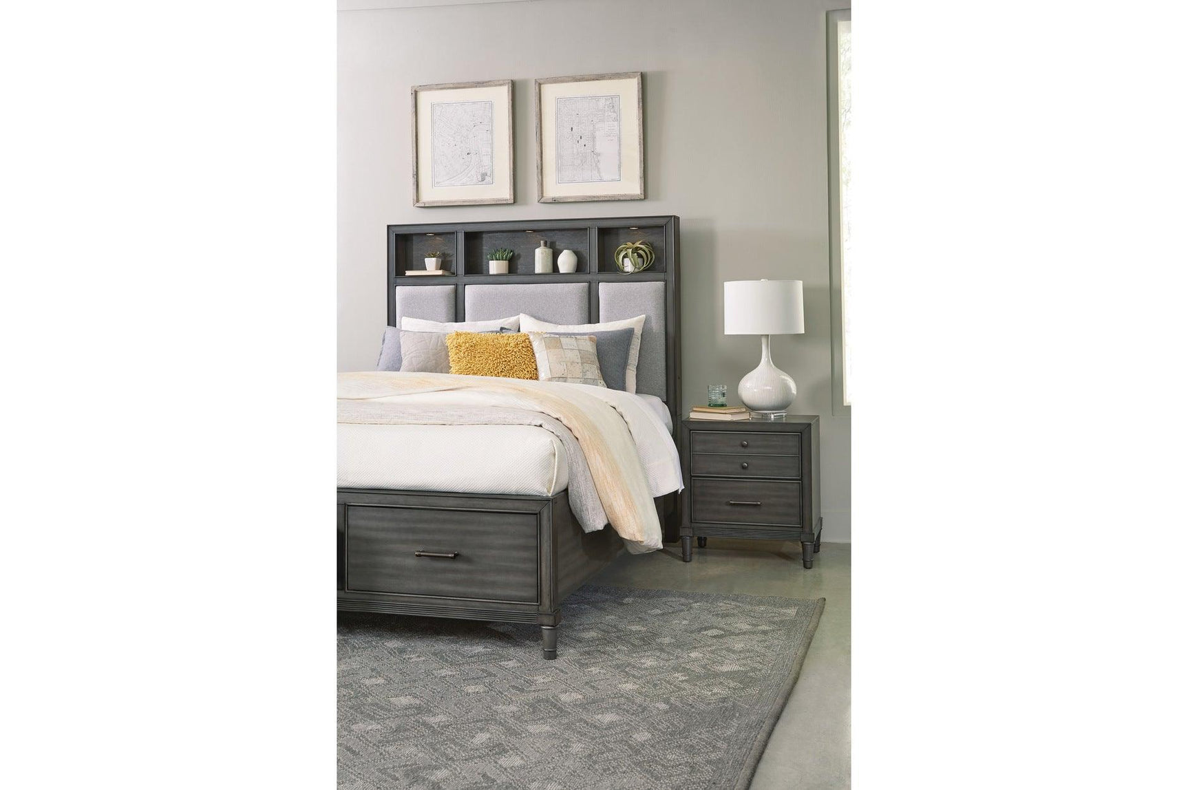 Side view of bed showing fabric upholstery and storage