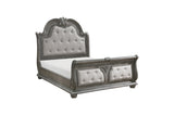 main front view of gray tufted panel bed