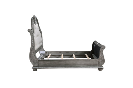 angled view of sleigh style upholstered bed