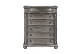 side view of tufted gray bed headboard