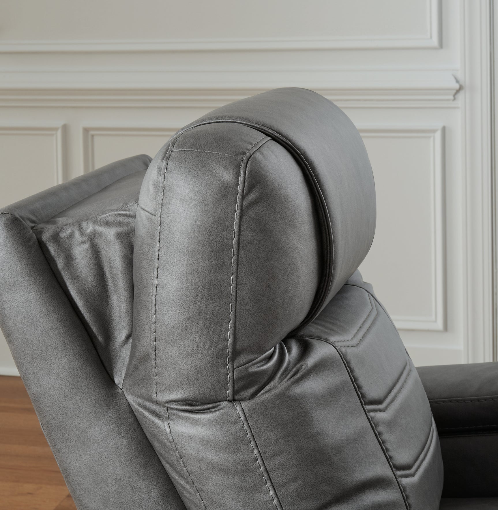 Close-up reclining view showing adjustable headrest