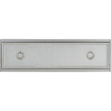Close-up of beveled mirrored drawer fronts with silver finish