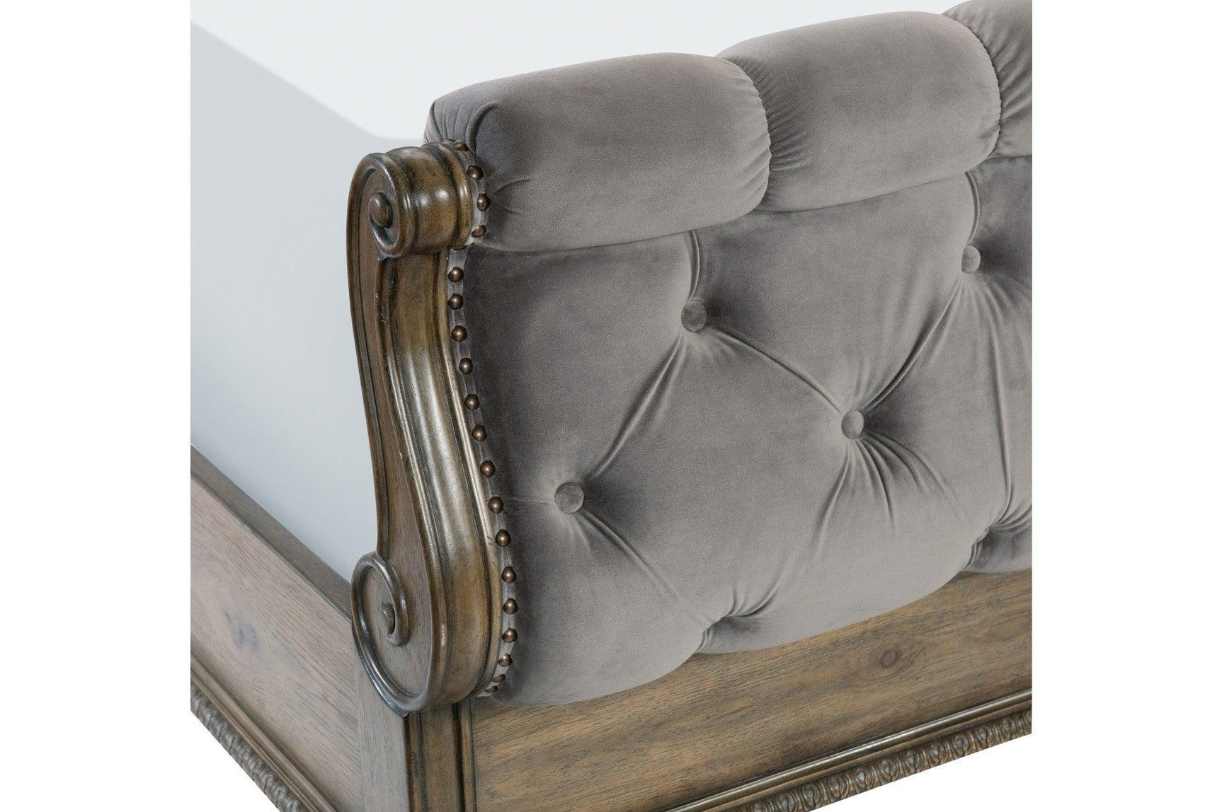 close side view of nailhead tufting on Rachelle Gray bed
