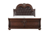 Bedroom view with Cavalier Dark Cherry tufted faux leather sleigh bed