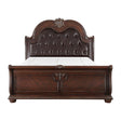Front view of Cavalier dark cherry king sleigh bed with tufted faux leather headboard