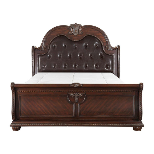 Front view of Cavalier dark cherry king sleigh bed with tufted faux leather headboard