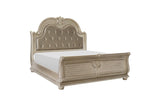Bedroom view of Cavalier Silver Faux Leather Tufted Sleigh King Bed