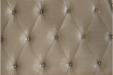 Close-up of tufted faux leather headboard