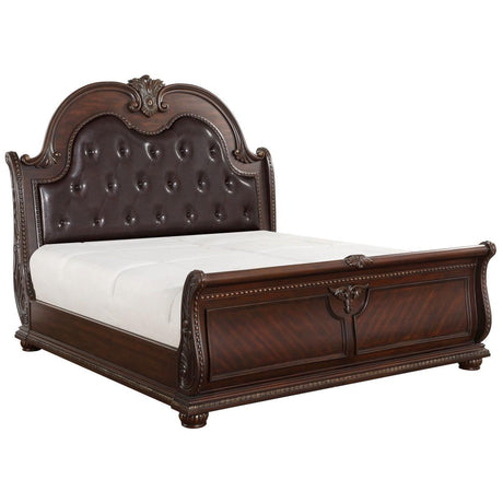 Detail of button-tufted faux leather headboard on Queen sleigh bed