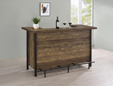 Side angle of Bellemore rustic oak bar unit showing storage compartments