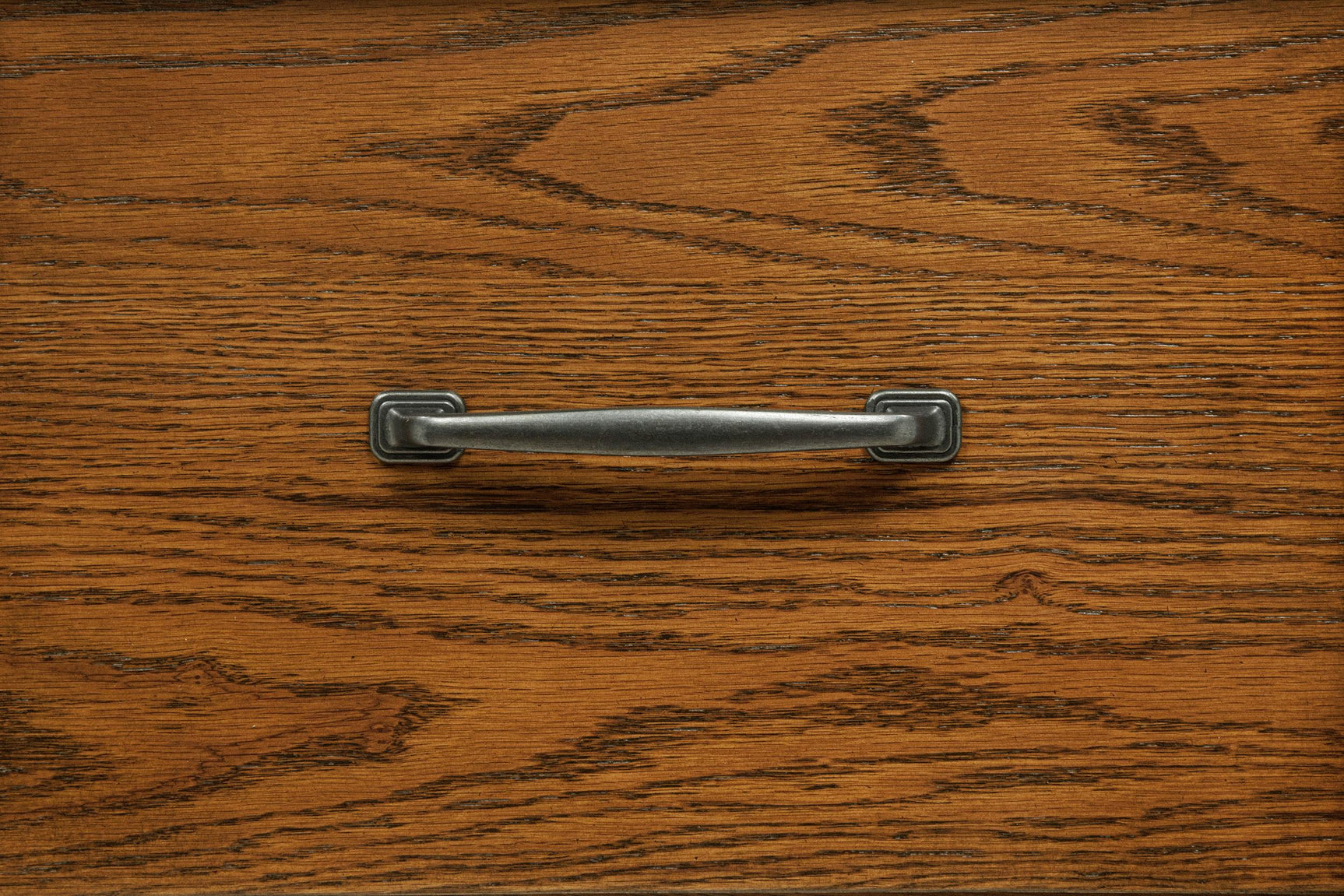 Plastic glide hardware on kitchen drawer