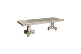 Detailed view of gold finish on table legs