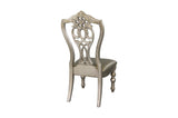 Dining table corner detail with gold finish