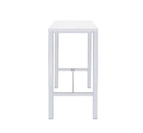 Bar stools arranged around the white lacquer bar table