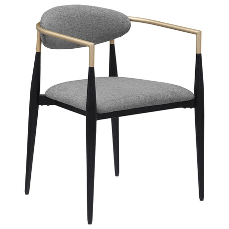 Detailed view of the padded grey fabric seat and oval backrest