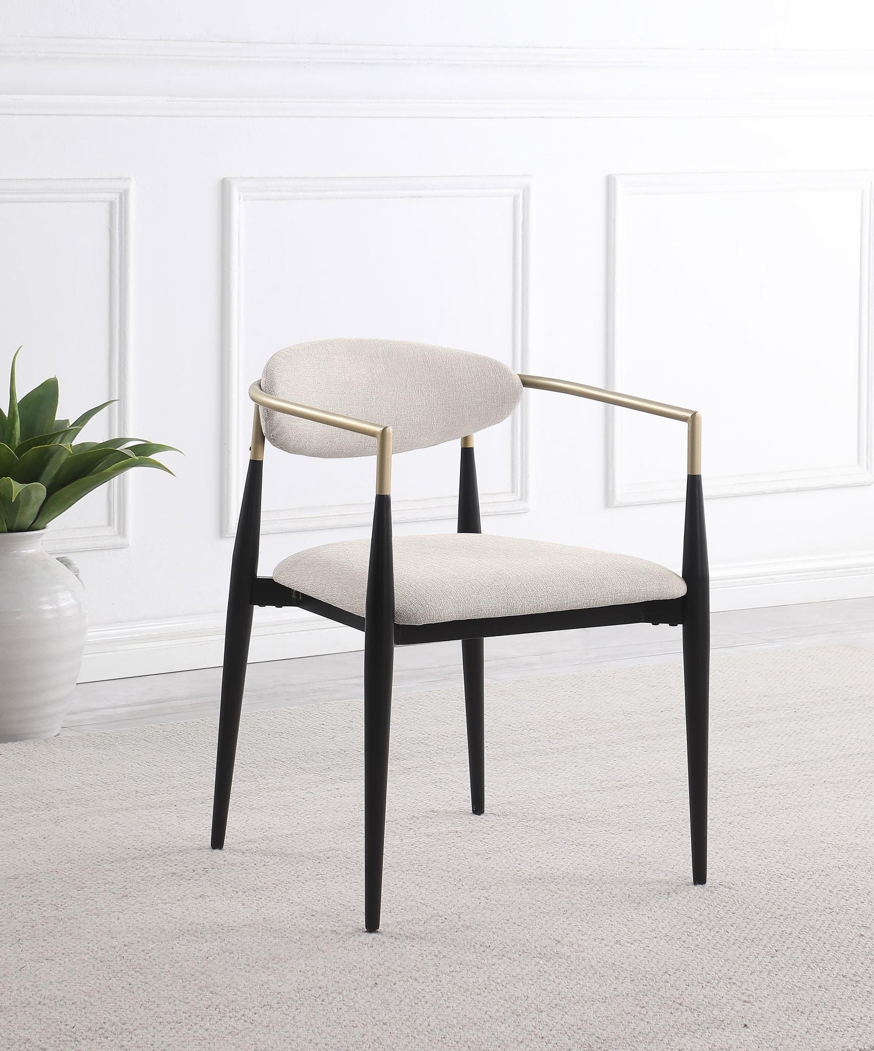 Alexis dining arm chair side view showing gold armrest