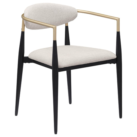 Beige upholstered dining chair with curved backrest close-up