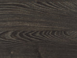 Edgerton round bar table in room setting showcasing dark oak finish and chrome legs