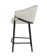 Back view showing curved high back of Chadwick stool