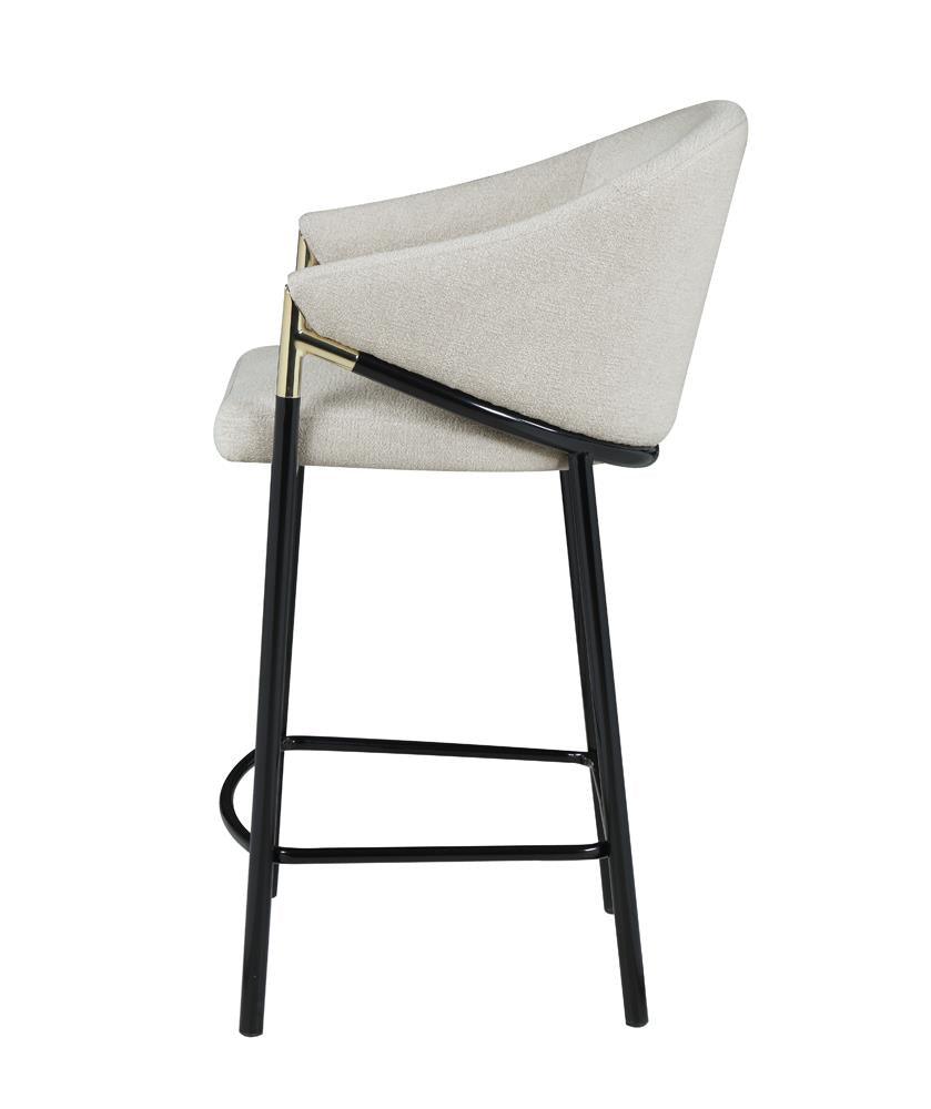 Back view showing curved high back of Chadwick stool