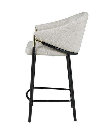 Back view showing curved high back of Chadwick stool