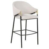 Chadwick bar chair angled side view showing upholstery and legs