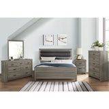 Kie gray upholstered eastern king panel bed side view