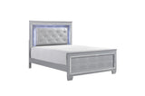 Side angle of tufted LED panel bed in silver faux leather