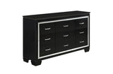 side close-up of Allura Black faux leather tufted LED panel bed