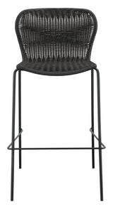 McKinley Bar Stool close-up of sandy black tubular metal legs and footrest