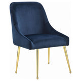 Front view of Kella marble dining table with four blue upholstered chairs