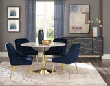 Kella dining set with round white marble table and brass base, side view