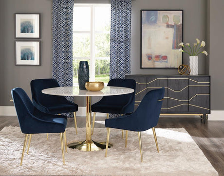 Kella dining set with round white marble table and brass base, side view