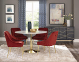 Living space featuring Kella round marble table and gold base with side chairs
