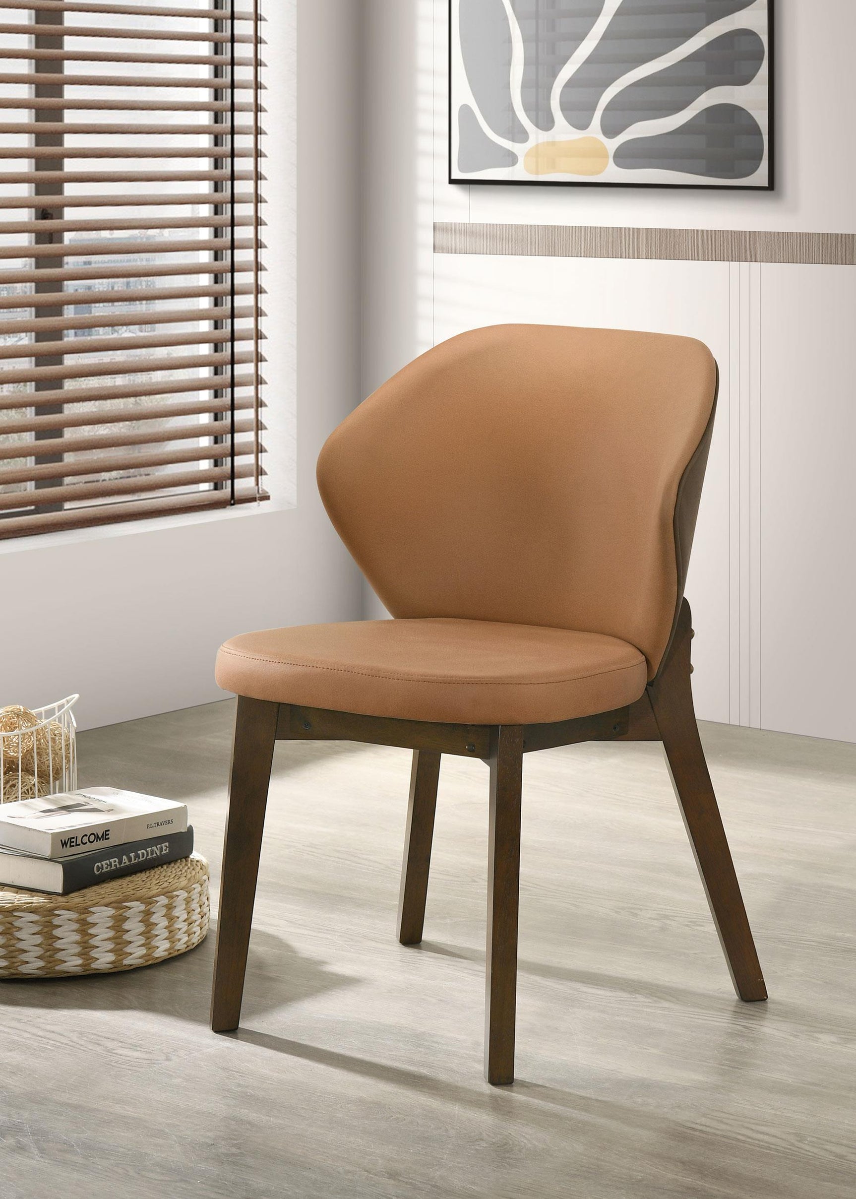 Randolph dining side chair, side profile showing curved back and wooden legs