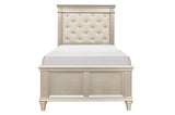 Close-up of pearlized faux leather tufted headboard