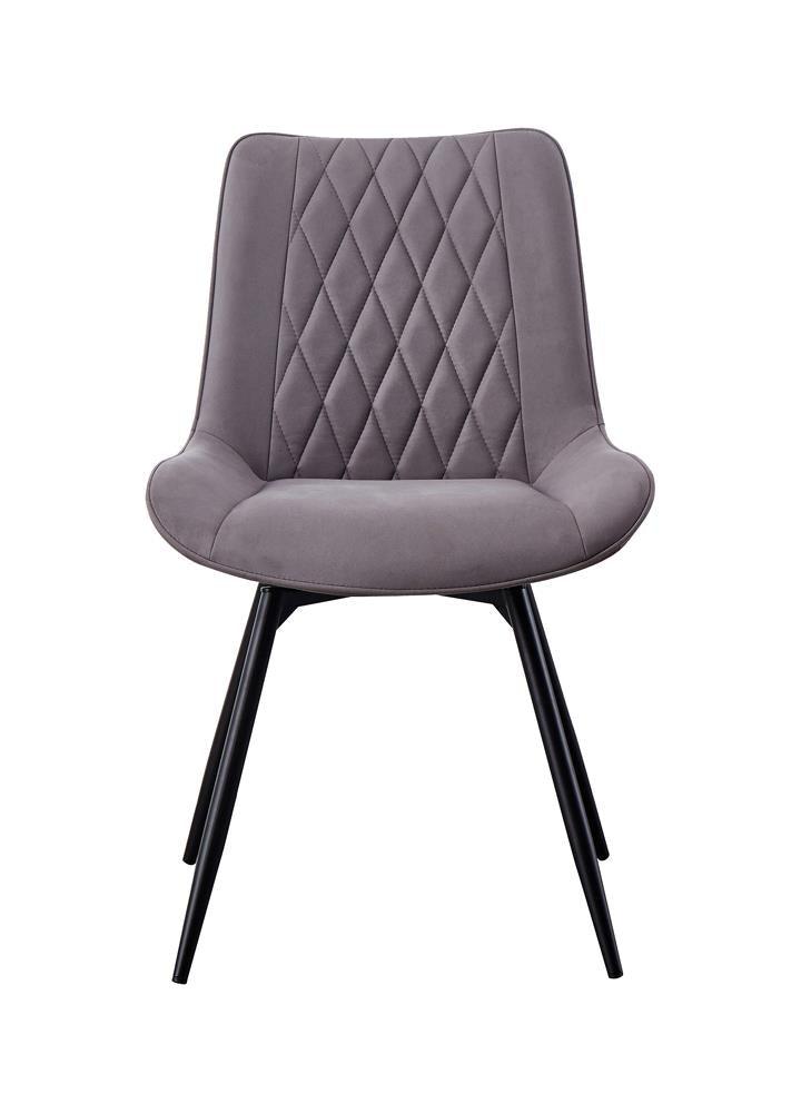 Close-up of tufted upholstery on Diggs Dining Chair