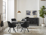 Close-up of vertical channel tufting and sloped arm on swivel dining chair