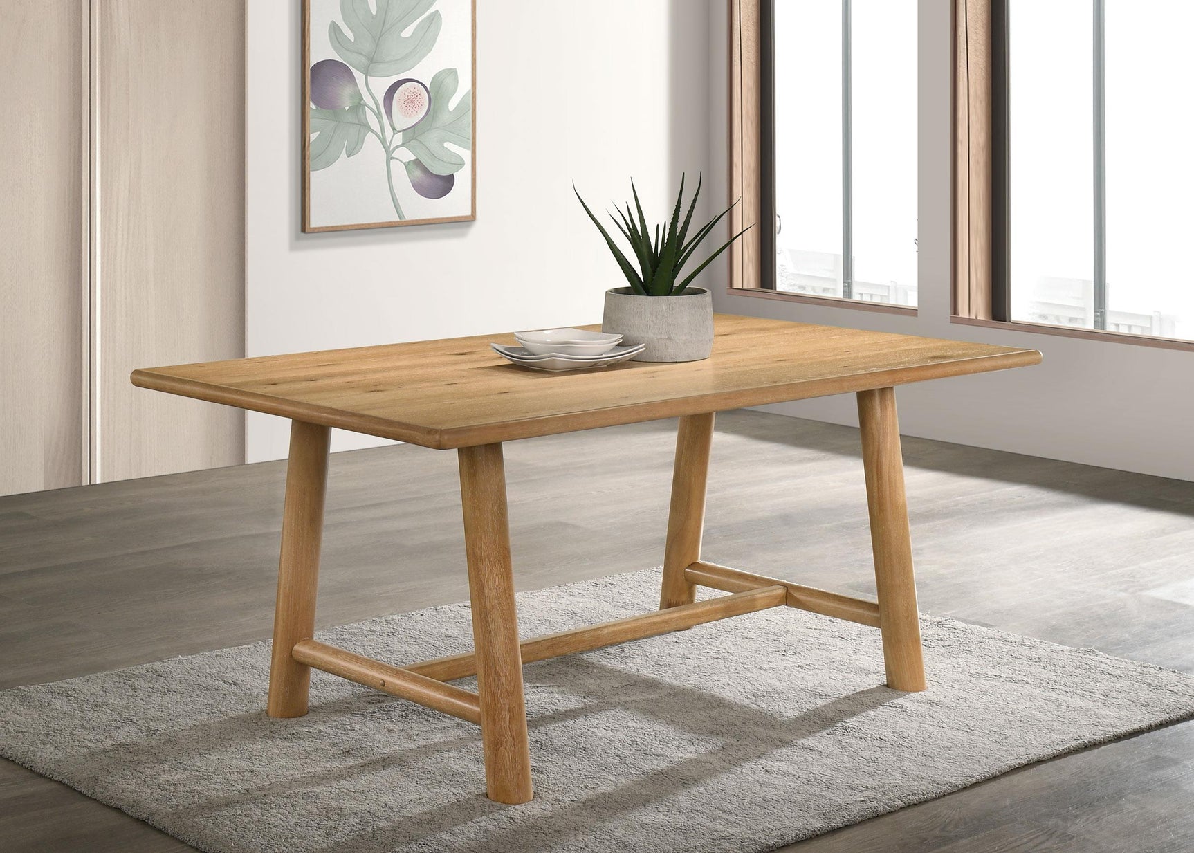 Duncan dining table side angle showing trestle base