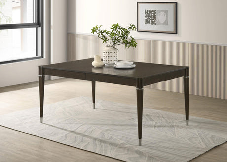 Metal-capped tapered leg and metallic accents detail on Reseda table