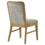 Grey fabric upholstery on chair backrest