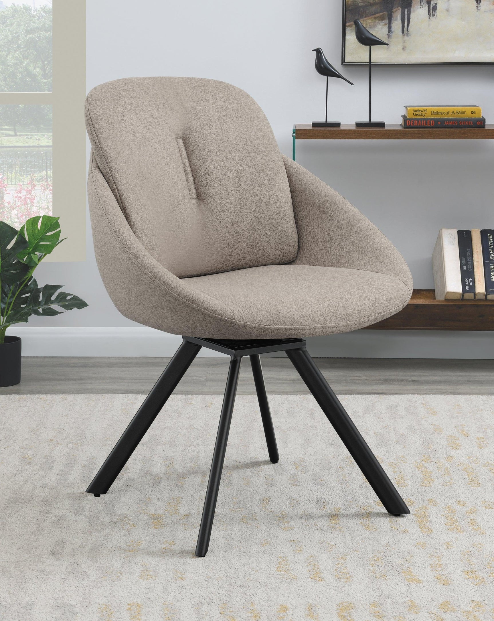 Close-up of metal table leg and leveler