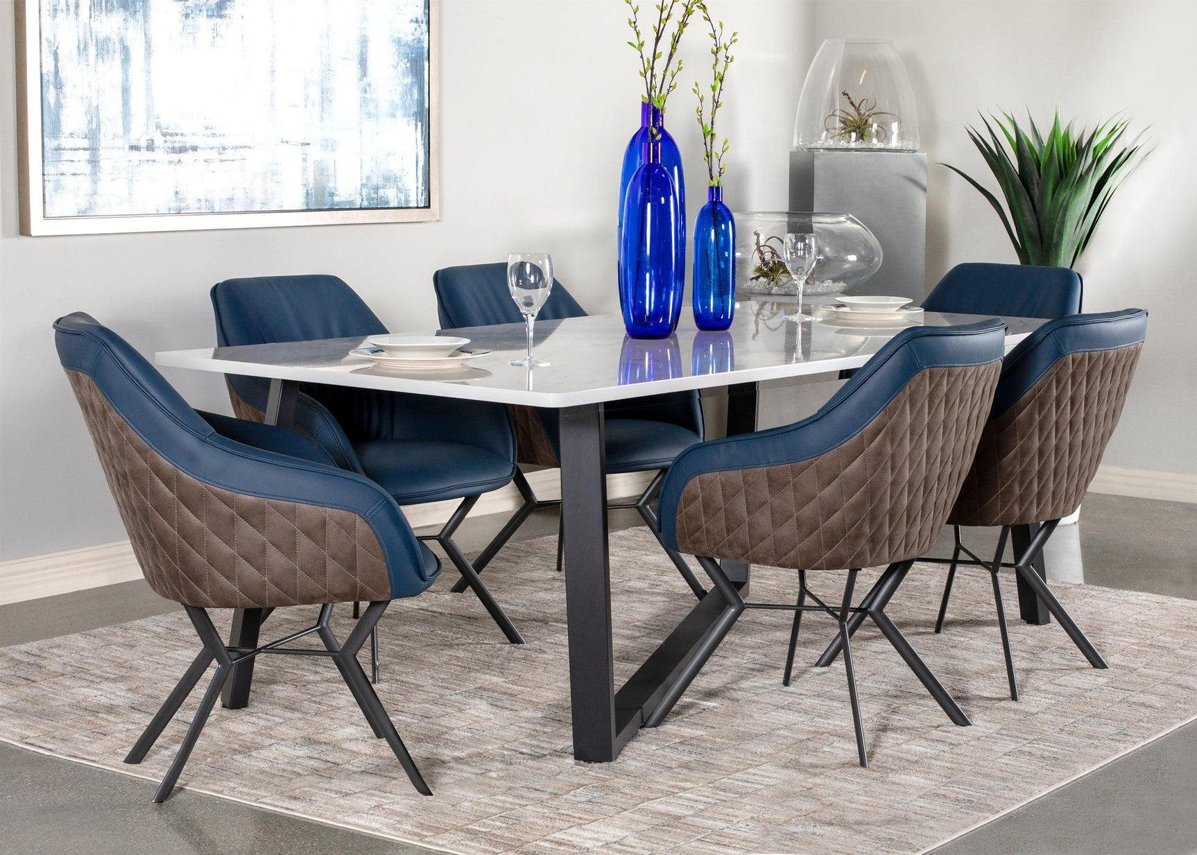 Gunmetal metal base and angled legs of Trevon dining chair