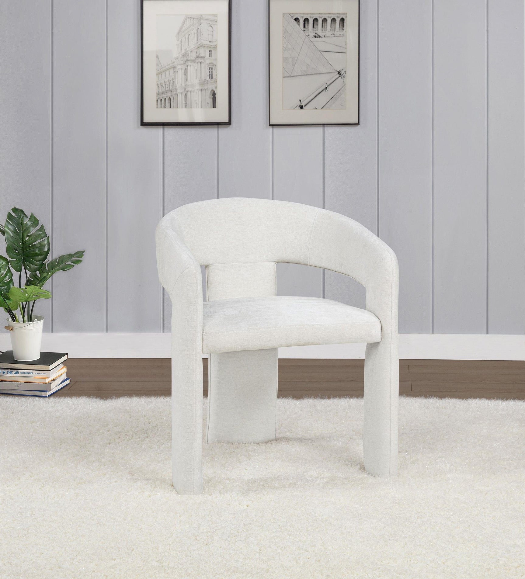 Carlow dining arm chair side angle in white upholstery
