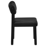 Dining room with Kehoe black upholstered chairs
