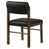 Kehoe upholstered dining side chair in black leatherette from front right angle