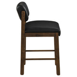 Armless Kehoe leatherette chair side profile