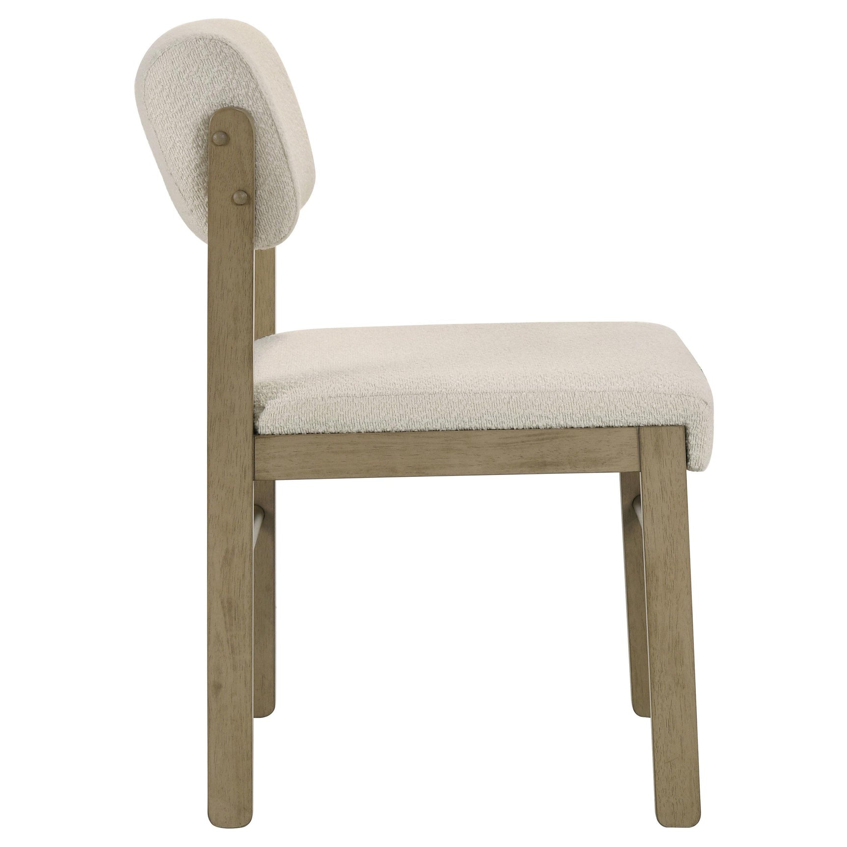 Armless design of Kehoe cream upholstered dining chair