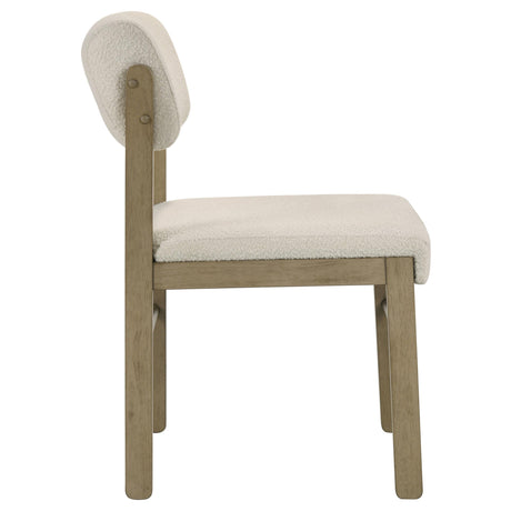 Armless design of Kehoe cream upholstered dining chair