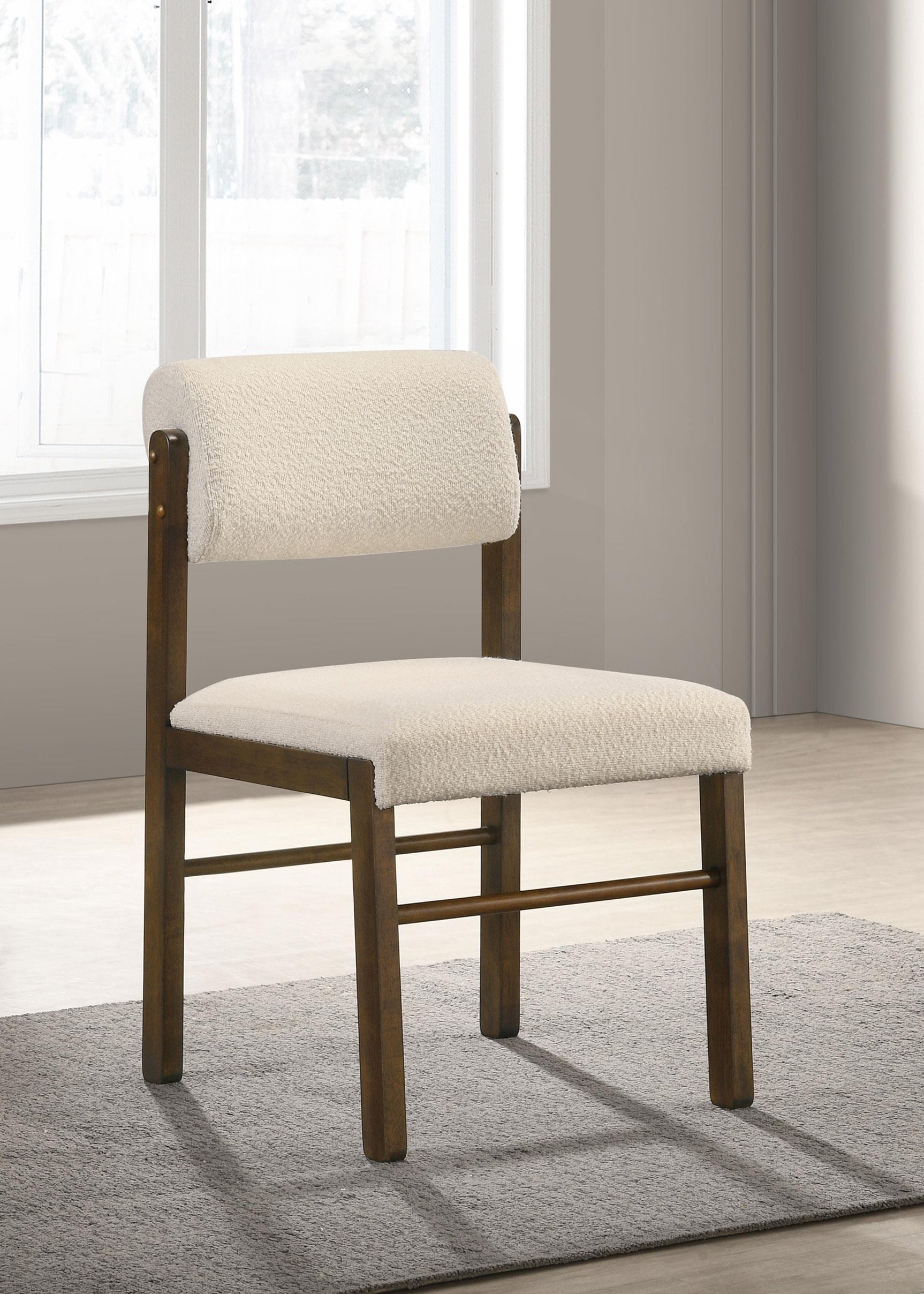 Kehoe chair close-up showing cream fabric upholstery